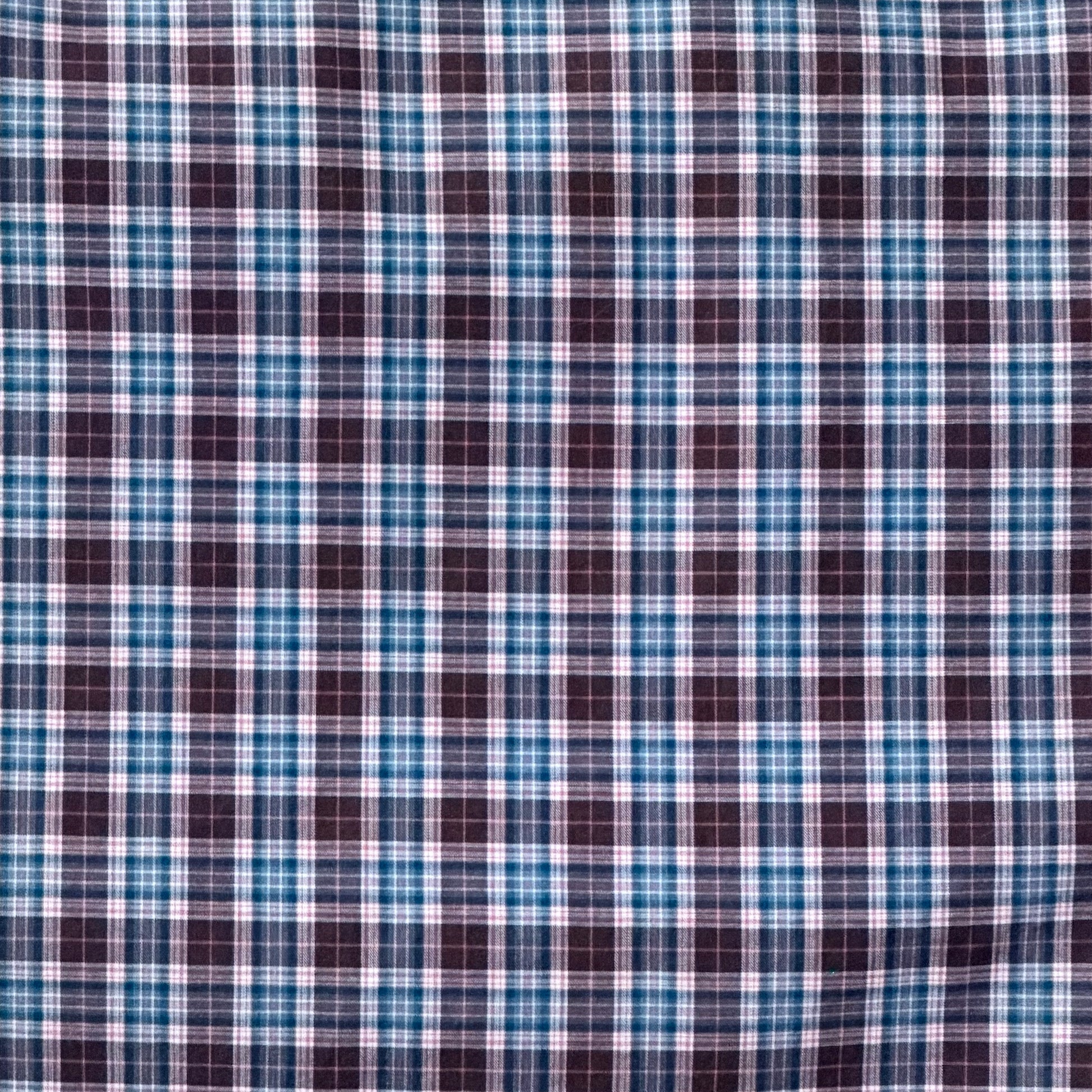 Close-up of blue and brown plaid fabric